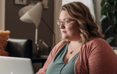 Woman researching on laptop