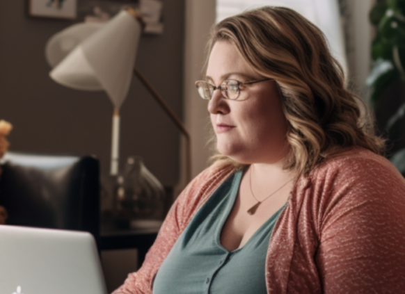 Woman researching on laptop