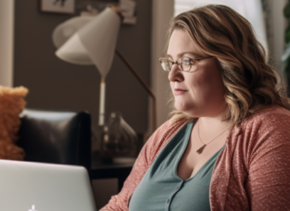 Woman researching on laptop