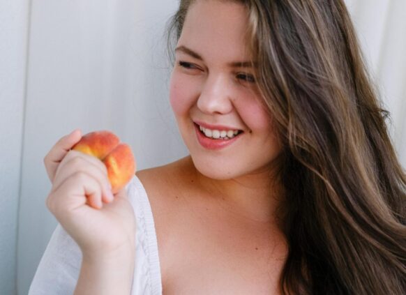 Woman eating an apple