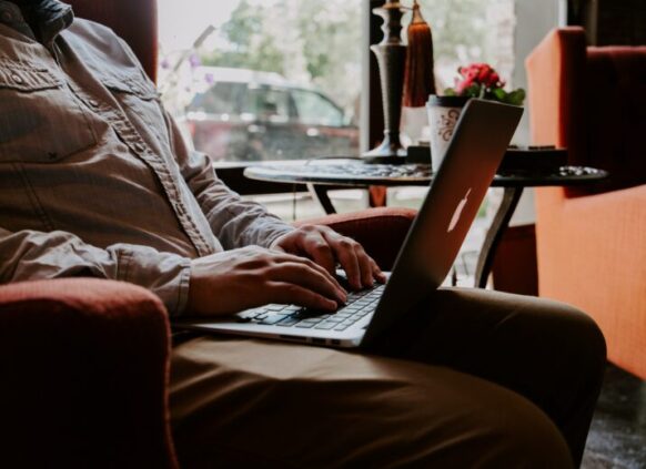 Person researching on laptop